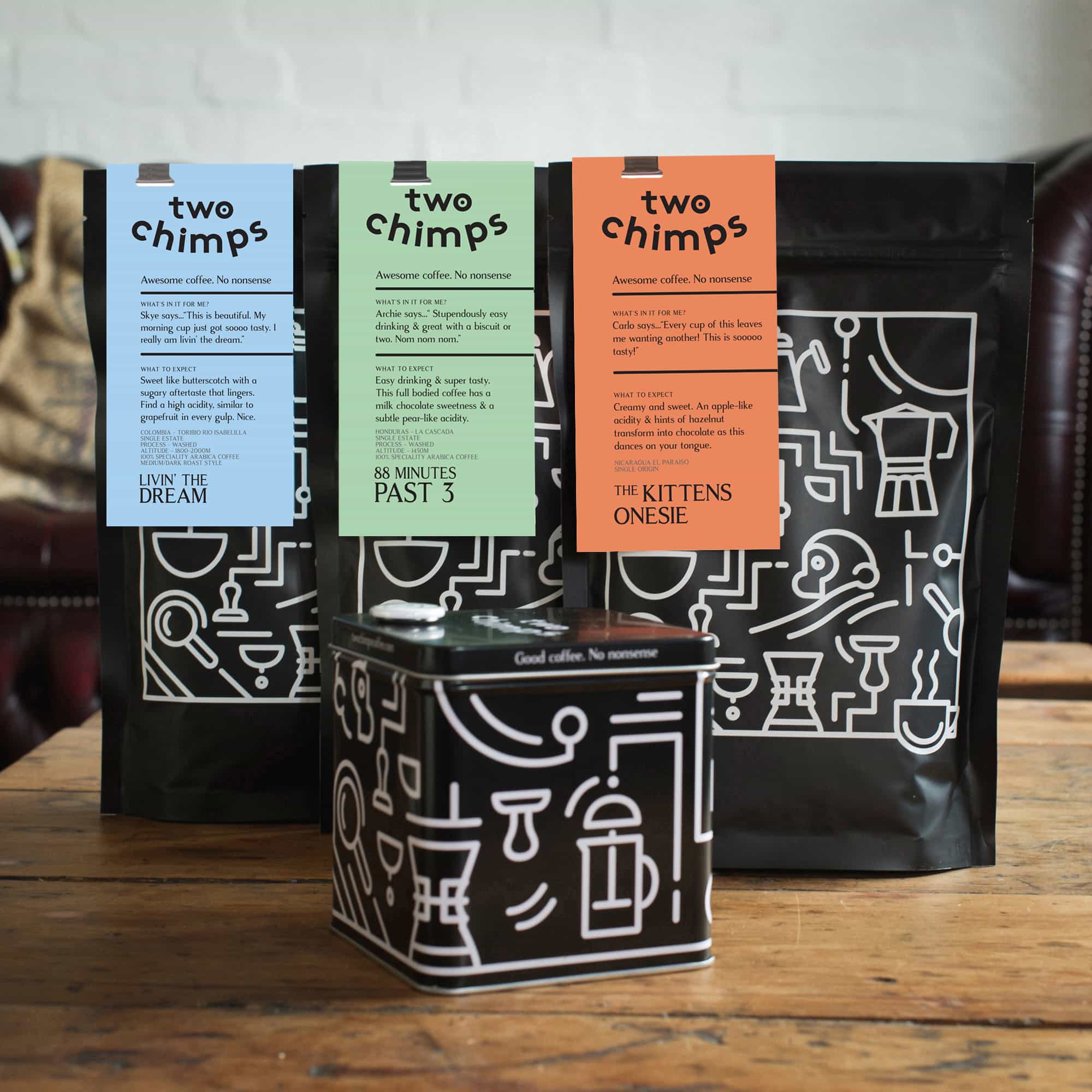 three bags of two chimps coffee and tin