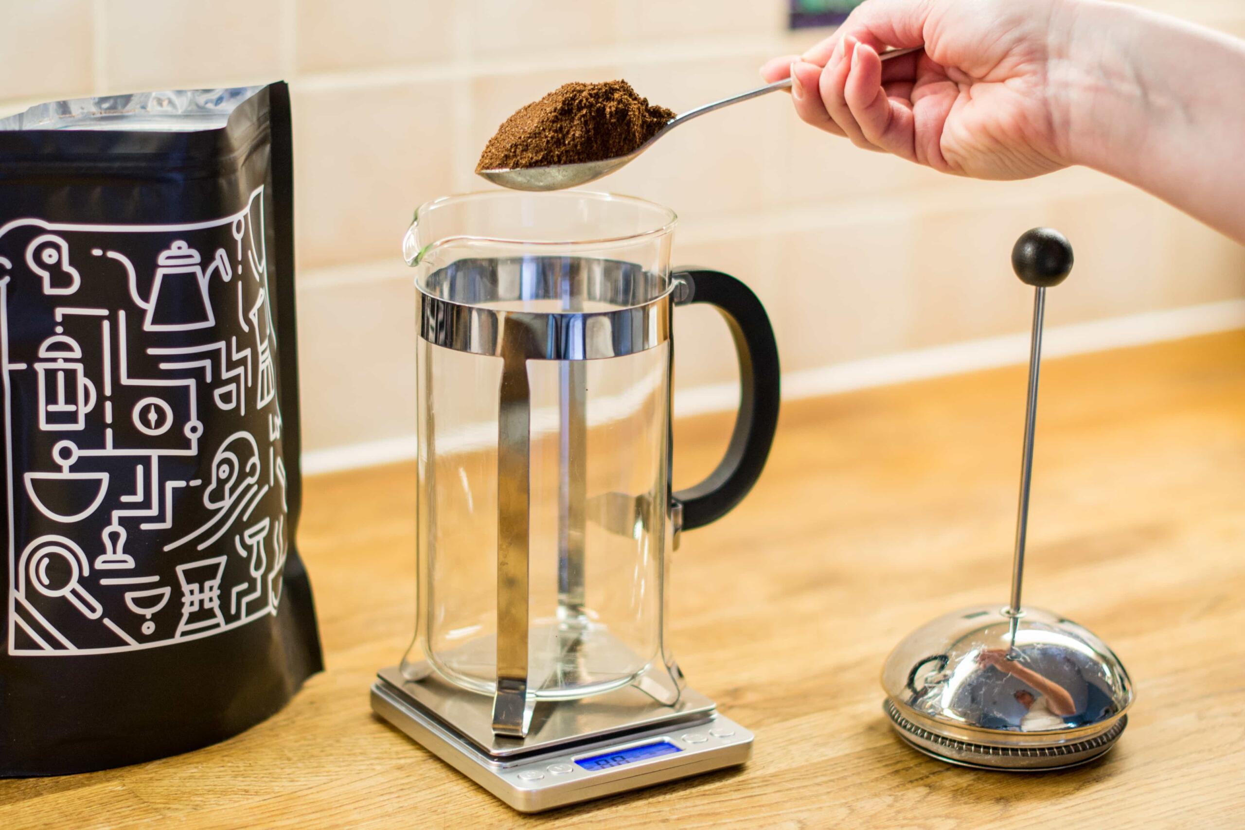 Weighing coffee into a cafetiere with Two Chimps Coffee bag 