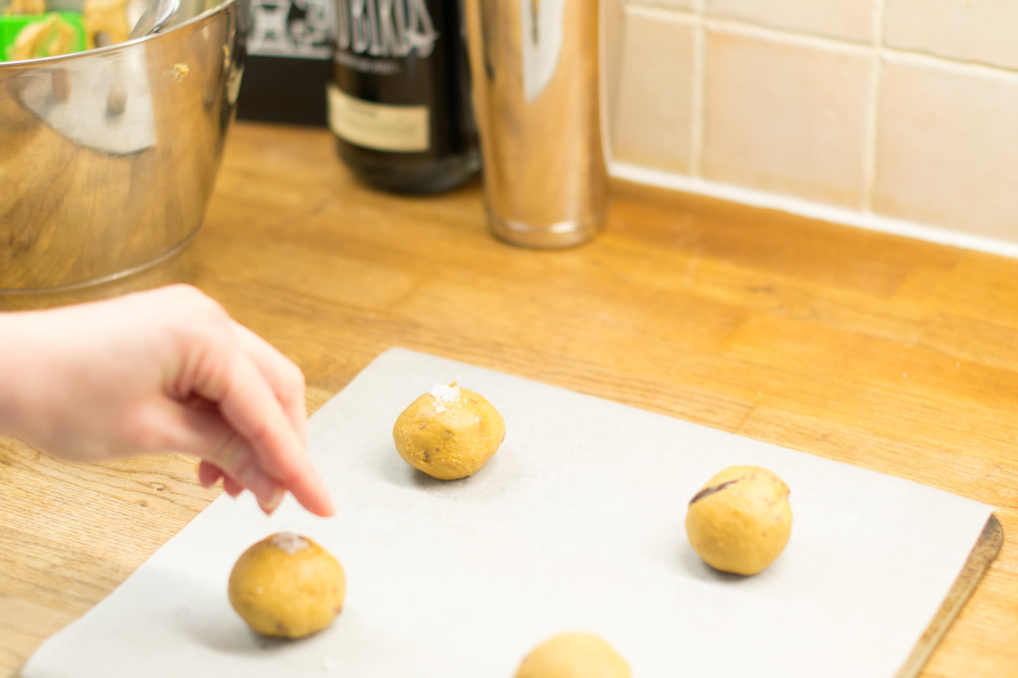 Placing dough balls on the baking tray