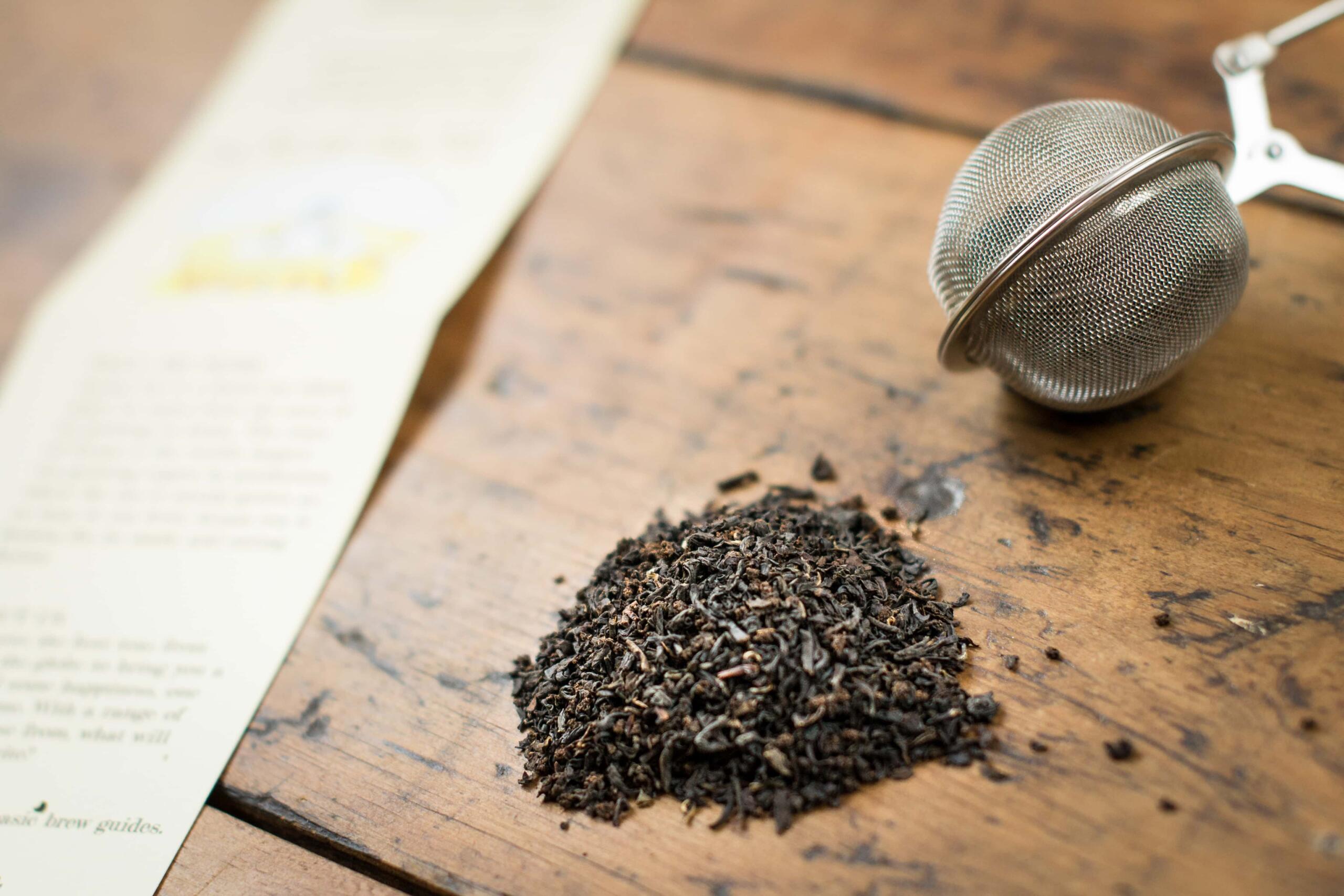 loose leaf tea with a strainer and label