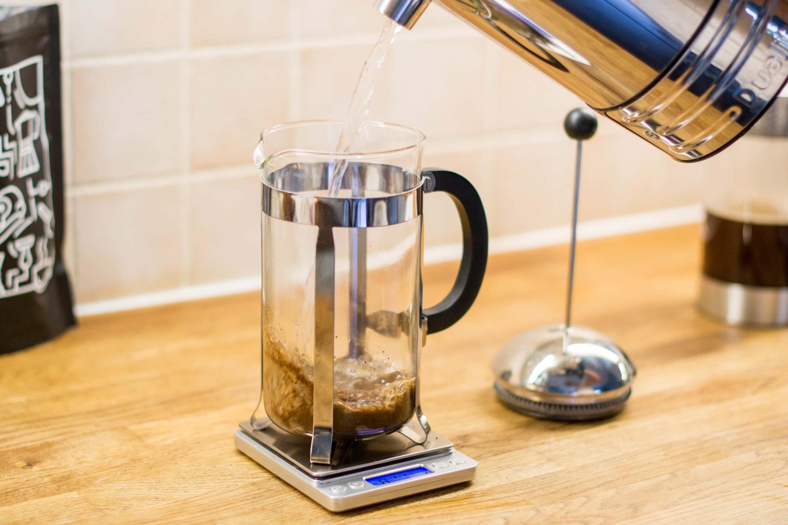 pouring hot water into a cafetiere