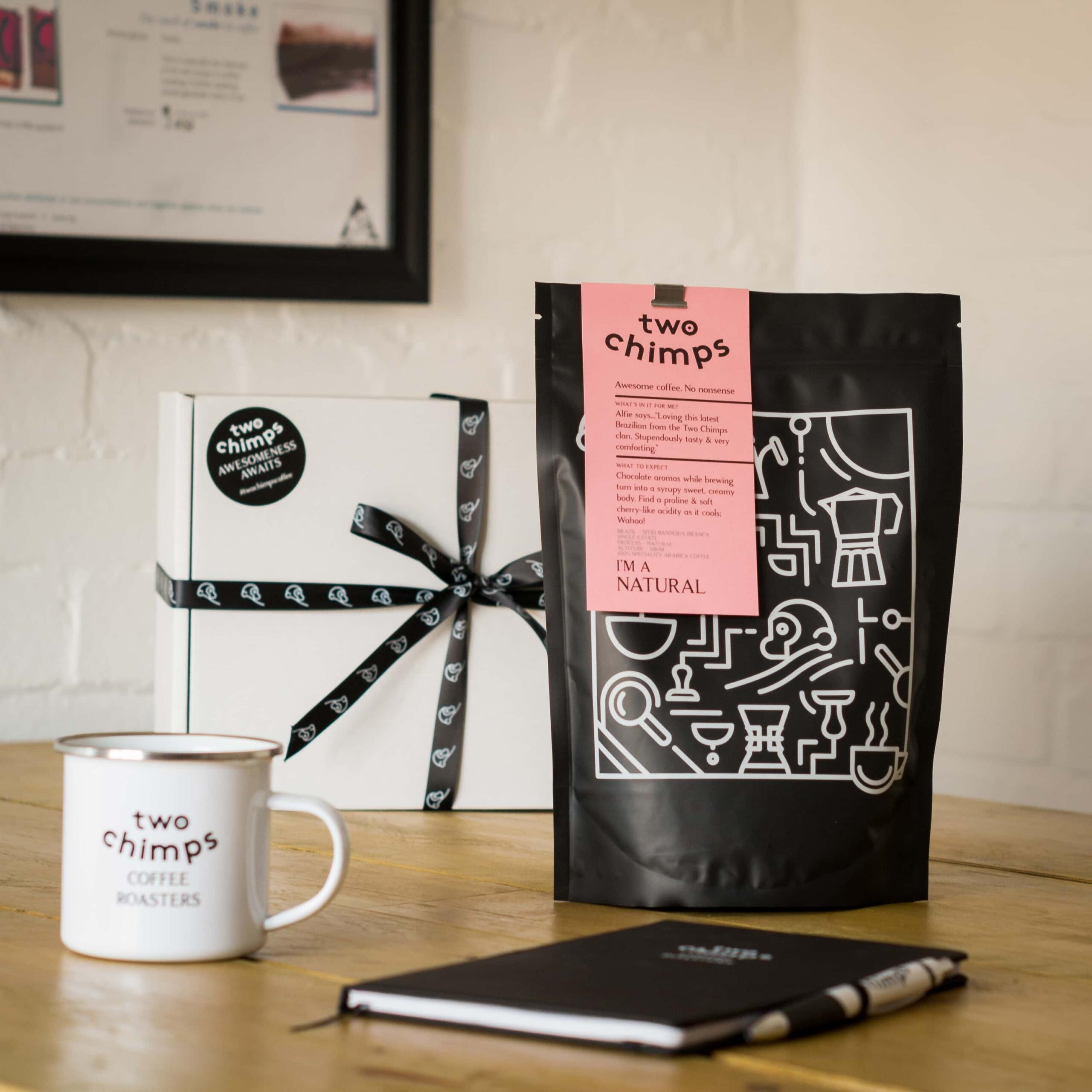 coffee bag with mug note book and pen
