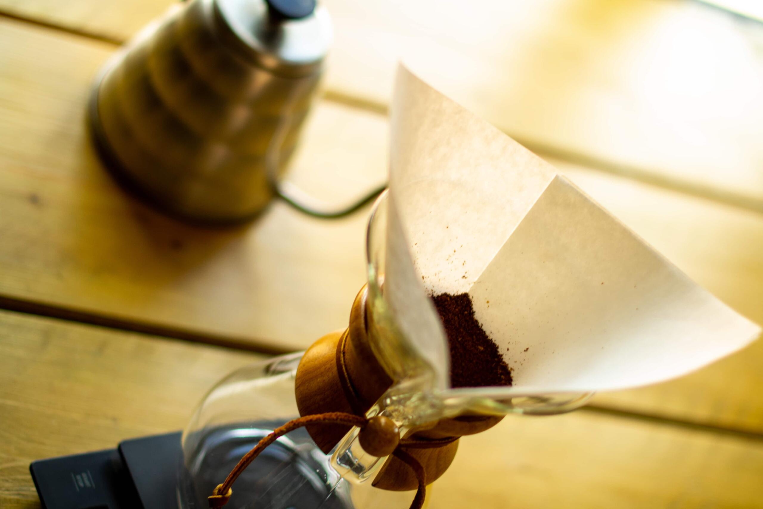 Chemex with grounds and swan neck kettle