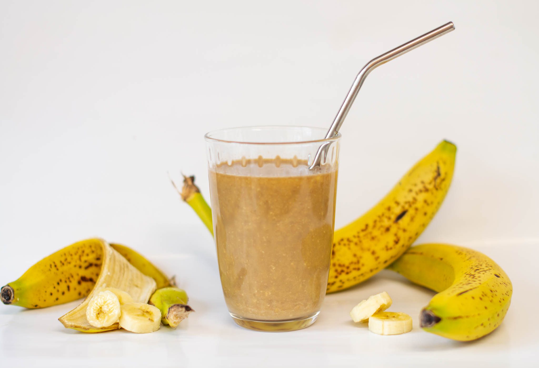 Glass of coffee smoothie with bananas