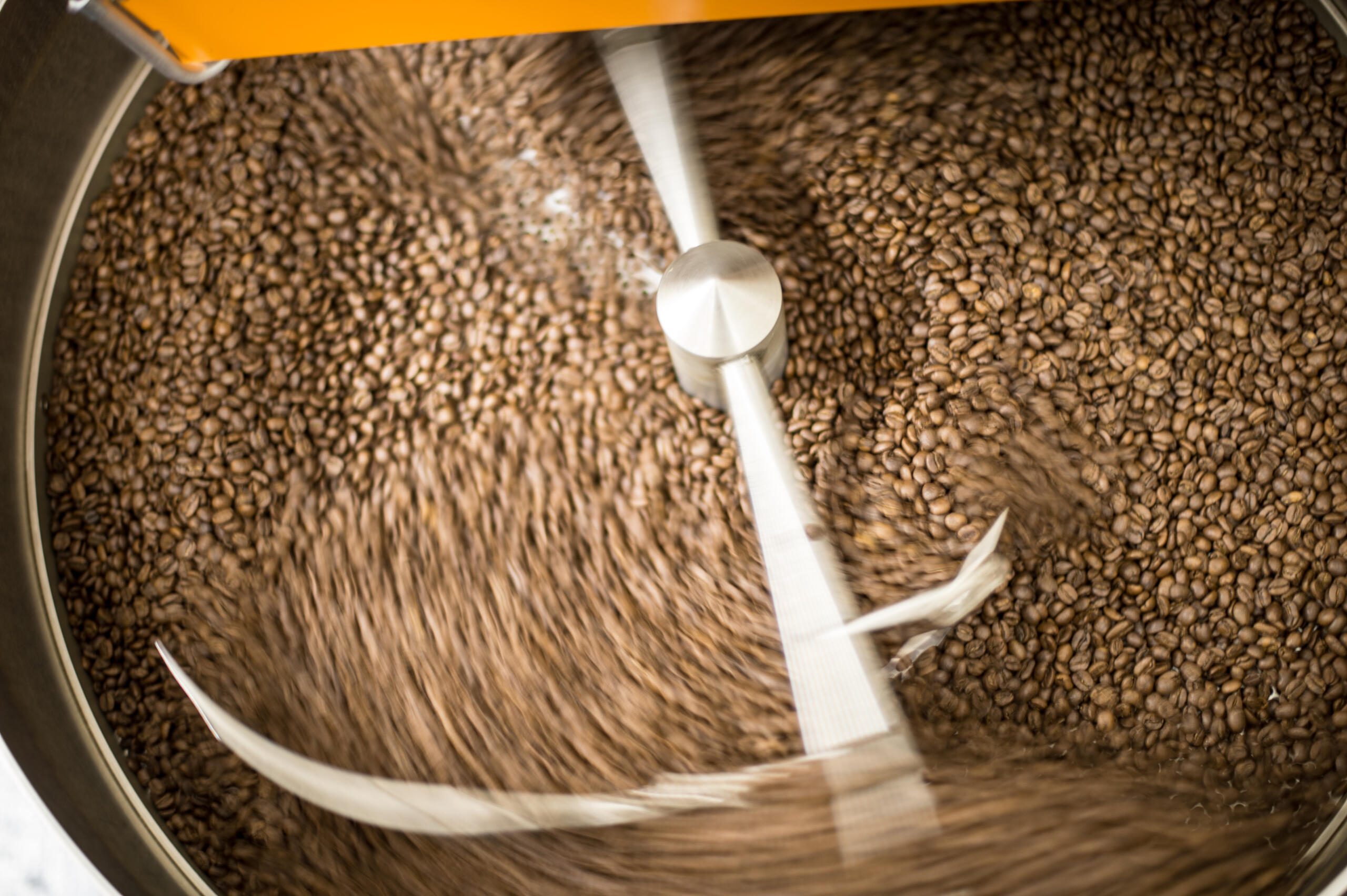 Coffee beans in cooling drum of roaster