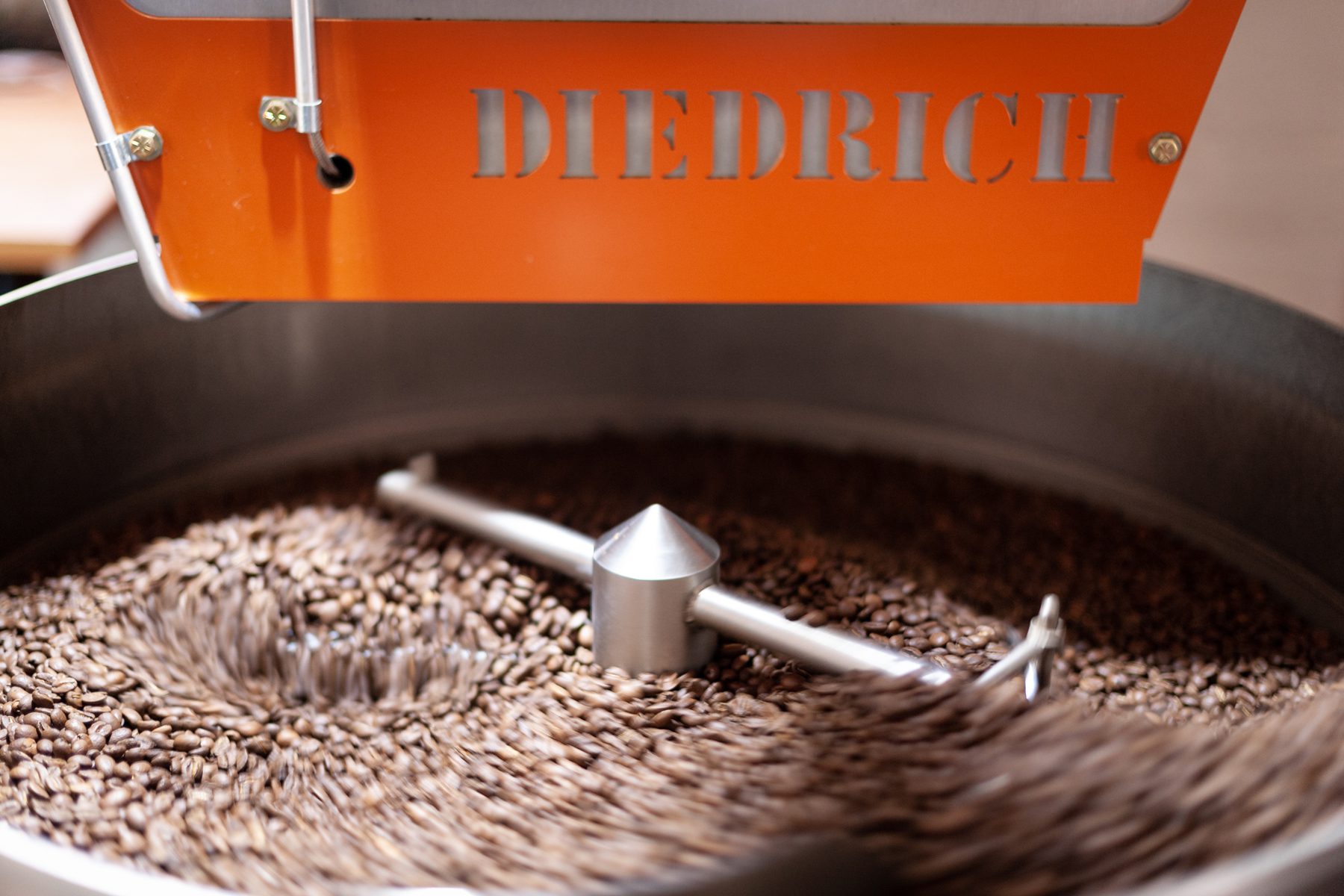 coffee beans in roaster cooling drum