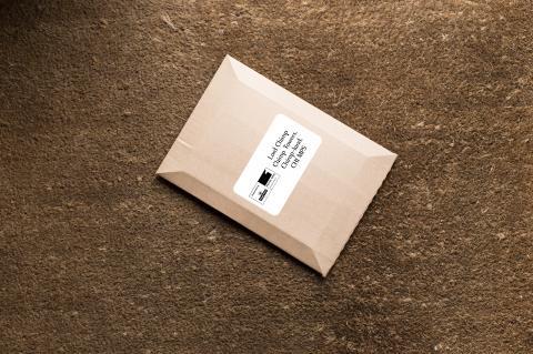 brown envelope on a doormat
