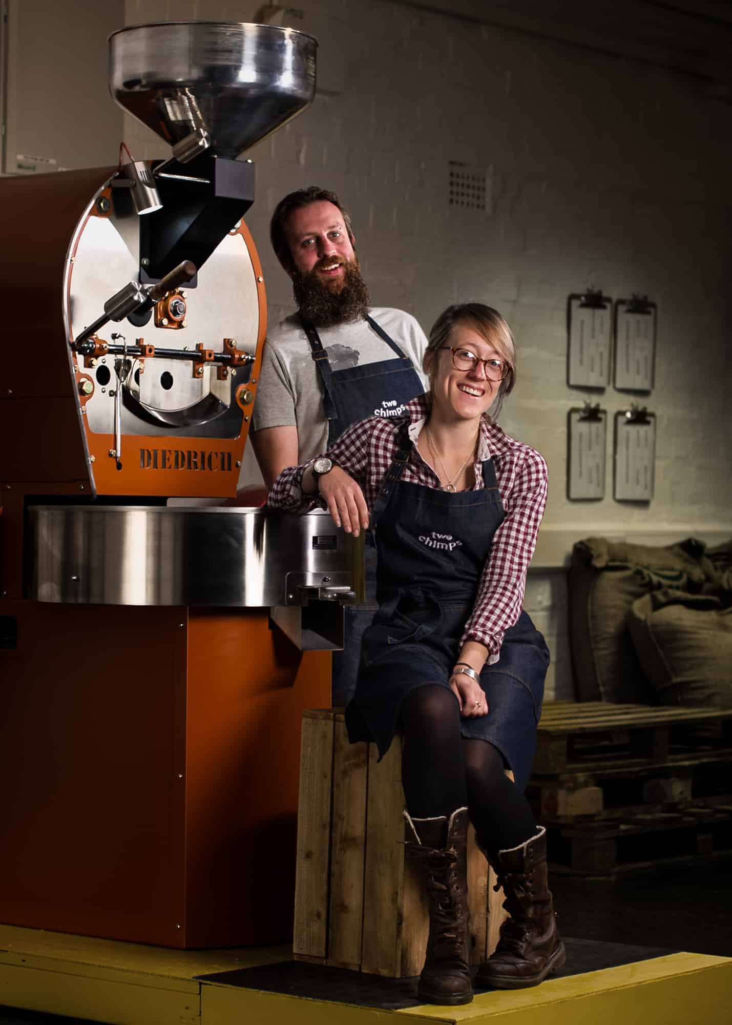 andy and laura the founders of two chimps coffee with their didrich coffee roaster