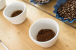 Ground coffee in a cupping bowl