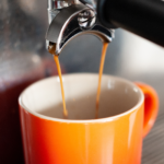 Coffee coming out of espresso machine