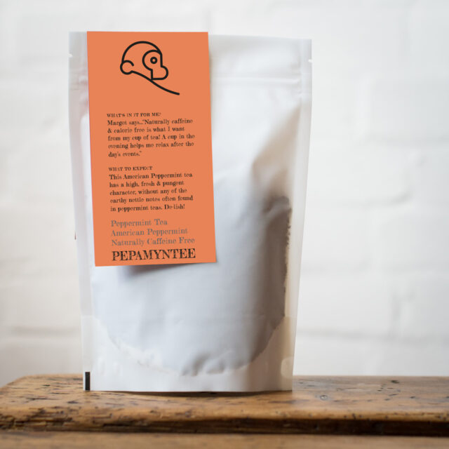 Loose leaf peppermint tea from Two Chimps on a wooden table