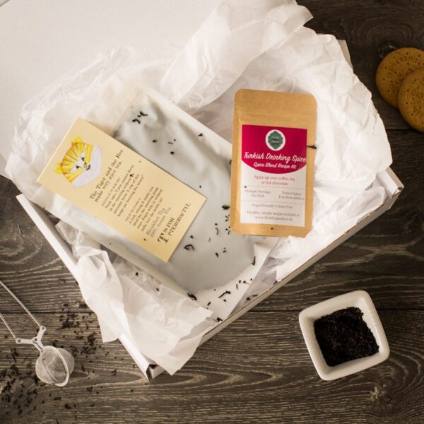 loose leaf breakfast tea with spice pouch and tea infuser in a white gift box