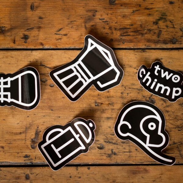Two Chimps Coffee Sticker Set on a table