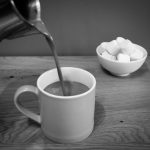 Pouring hot chocolate into a mug