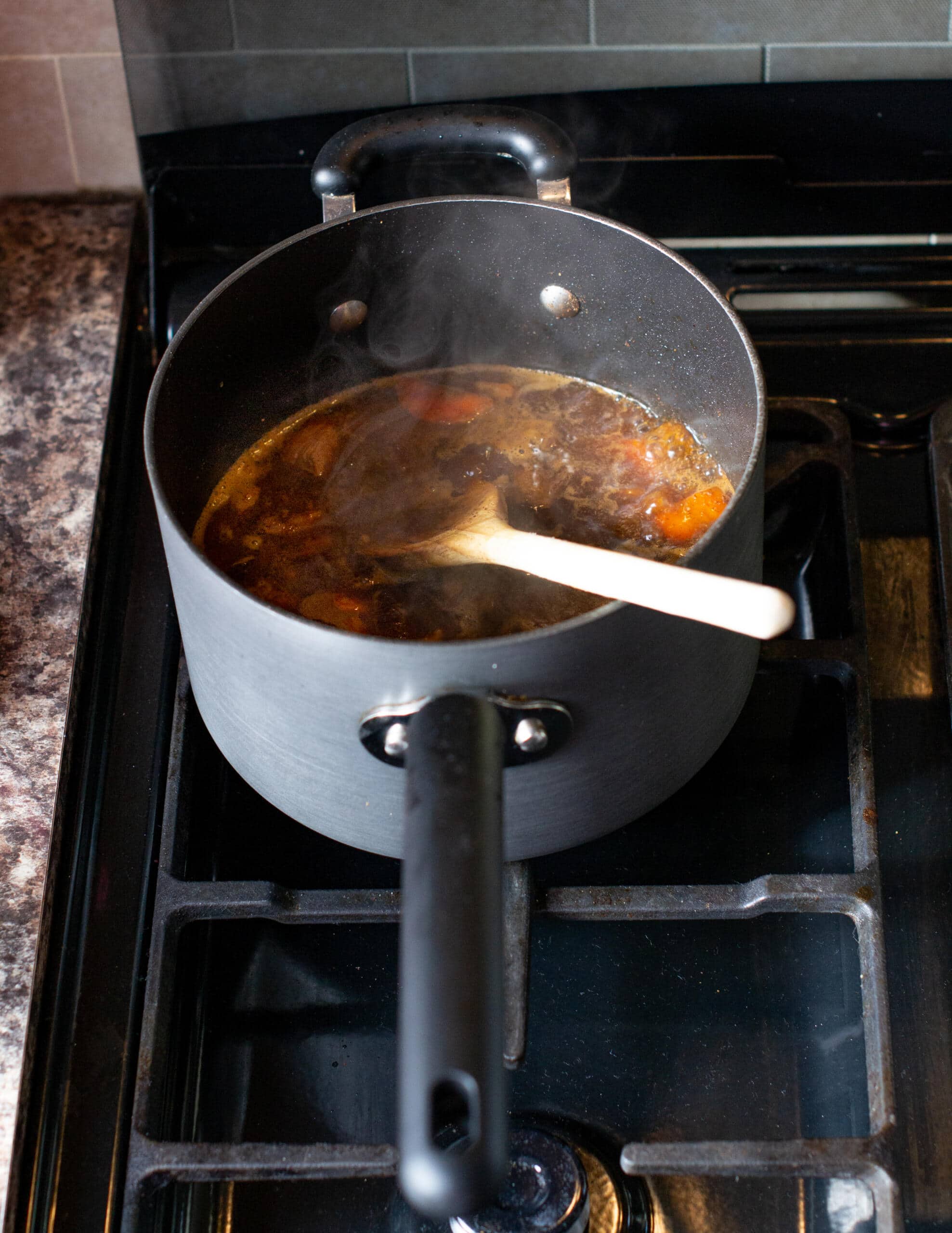 Simmering lamb tagine on the hob