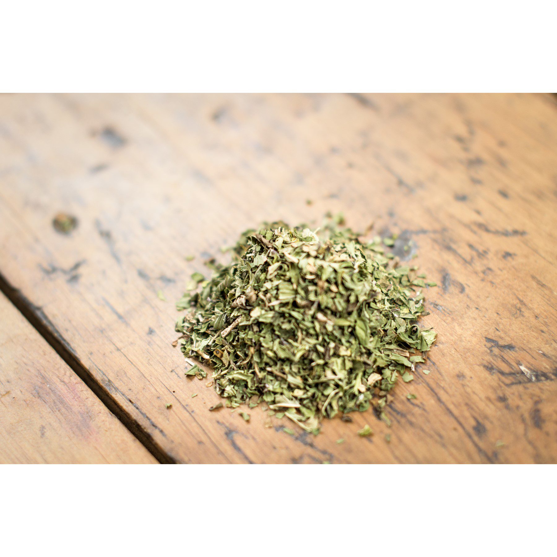 Loose leaf green tea on a wooden table