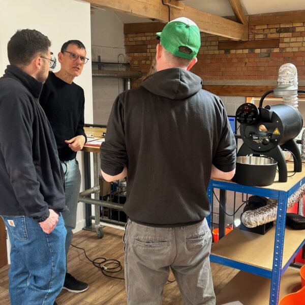 Andy gives guests a roast your own coffee workshop in the two chimps roastery