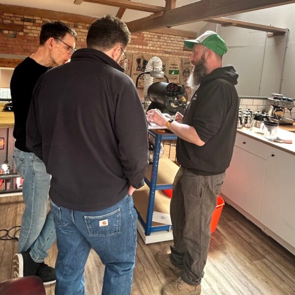 Andy gives guests a roast your own coffee workshop in the two chimps roastery
